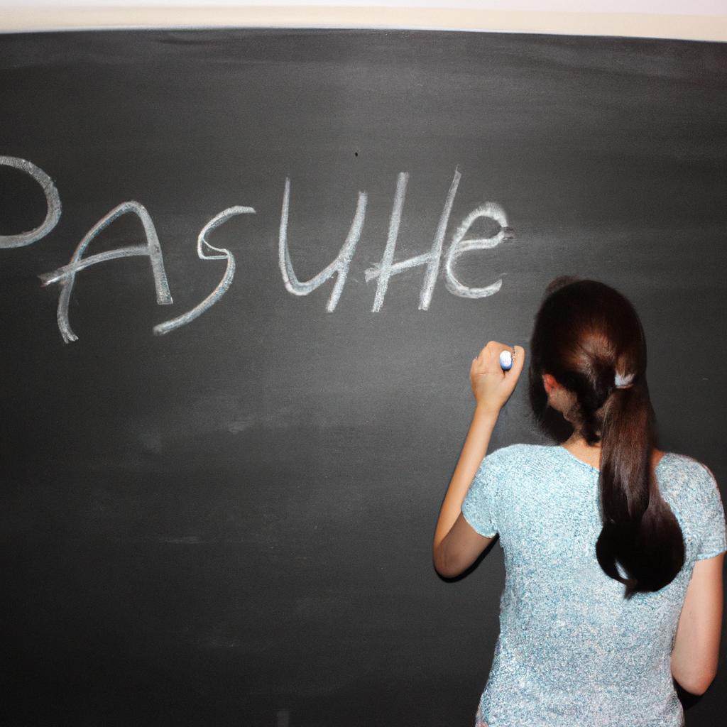 Person writing on a blackboard